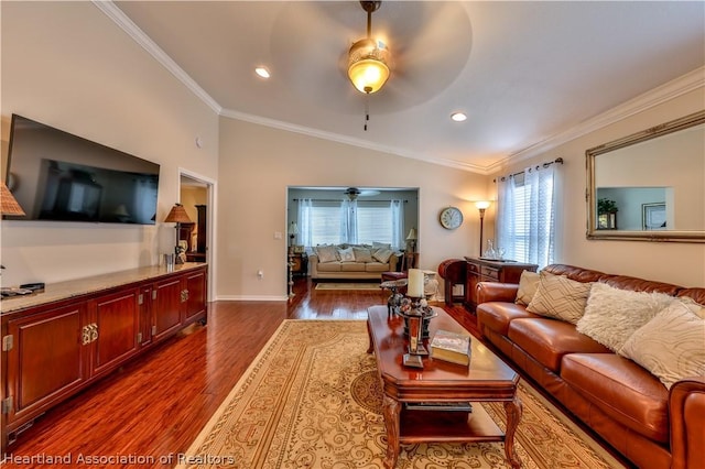 living room featuring dark hardwood / wood-style flooring, plenty of natural light, and ornamental molding