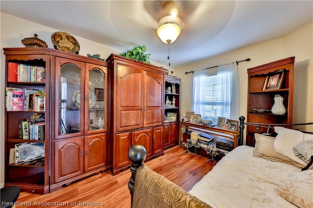 office featuring light hardwood / wood-style floors and ceiling fan