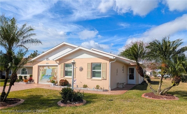 view of front of home with a front yard