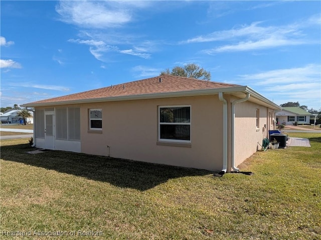 view of property exterior featuring a yard