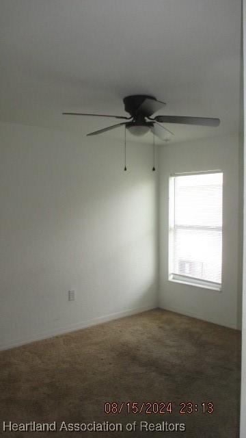 unfurnished room with carpet