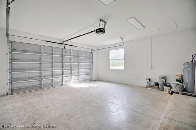 2545 N Odessa Rd, Avon Park, FL 33825 - garage with water heater and a garage door opener