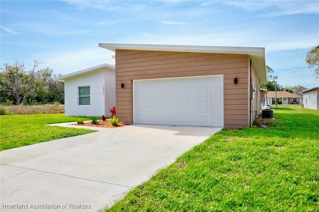 2545 N Odessa Rd, Avon Park, FL 33825 - view of front of house featuring a front lawn, concrete driveway, and central AC unit