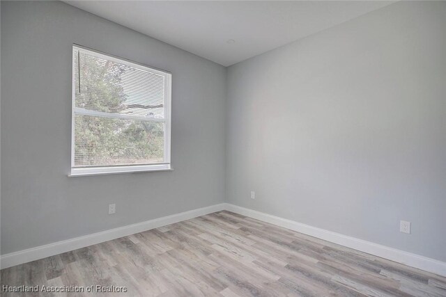 2545 N Odessa Rd, Avon Park, FL 33825 - spare room featuring light wood-style floors and baseboards