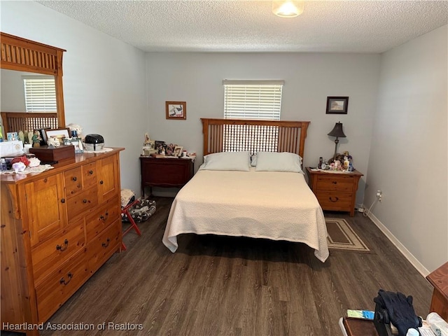 103 Fox Rd, Lake Placid, FL 33852 - bedroom with a textured ceiling and dark wood-style floors