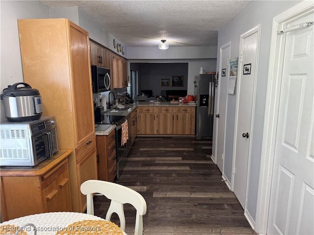 103 Fox Rd, Lake Placid, FL 33852 - kitchen with a sink, black range with electric cooktop, a toaster, stainless steel refrigerator with ice dispenser, and dark wood finished floors