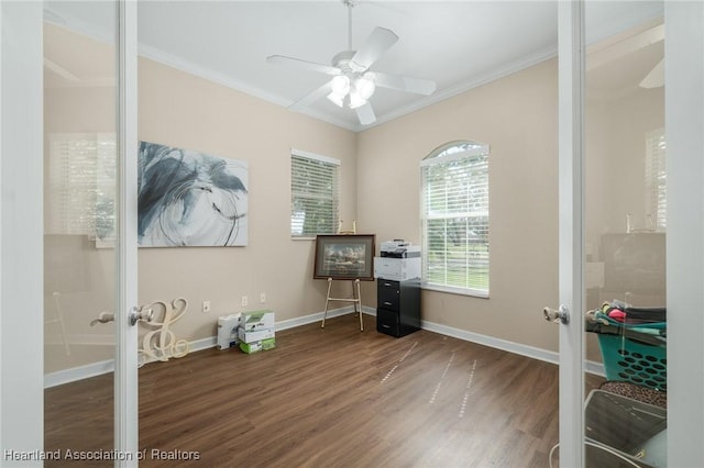 home office with ceiling fan, french doors, dark hardwood / wood-style floors, and ornamental molding