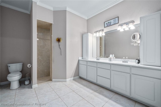 bathroom with a tile shower, tile patterned floors, crown molding, toilet, and vanity