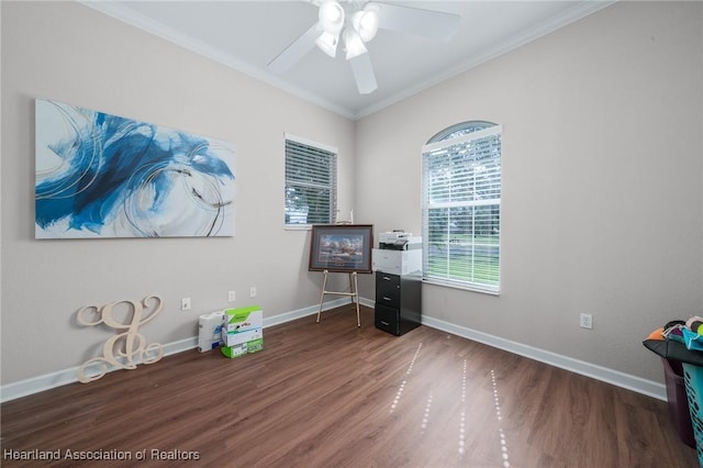 misc room featuring ceiling fan, dark wood-type flooring, and ornamental molding