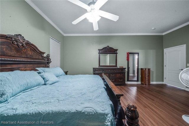 bedroom with hardwood / wood-style flooring, ceiling fan, and ornamental molding