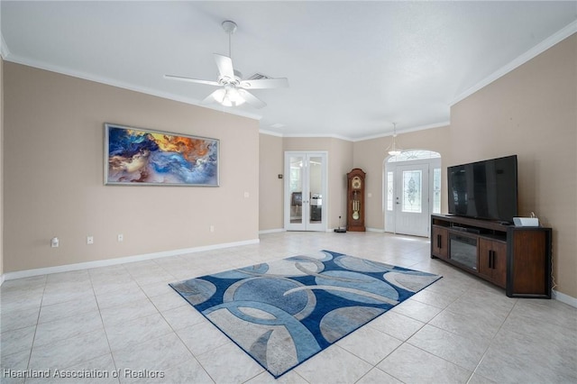 living room featuring ceiling fan, light tile patterned flooring, ornamental molding, and french doors