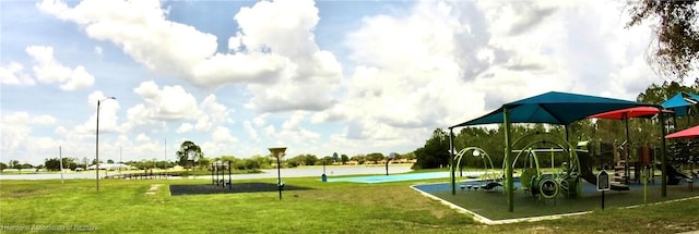 6978 Mexican Hat Dr, Sebring, FL 33872 - community play area featuring a lawn