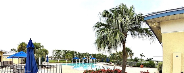 6978 Mexican Hat Dr, Sebring, FL 33872 - community pool featuring a patio