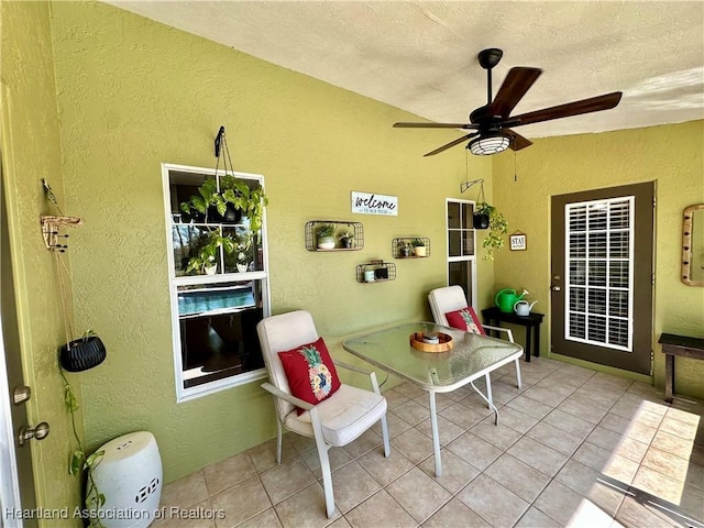 view of patio with ceiling fan