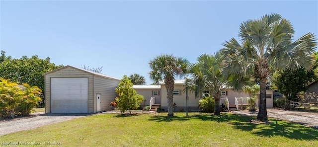 exterior space featuring a front lawn and a storage unit