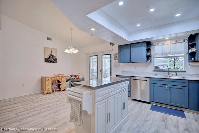 4231 Leaf Rd, Sebring, FL 33875 - kitchen with stainless steel dishwasher, light wood-style flooring, a sink, and open shelves
