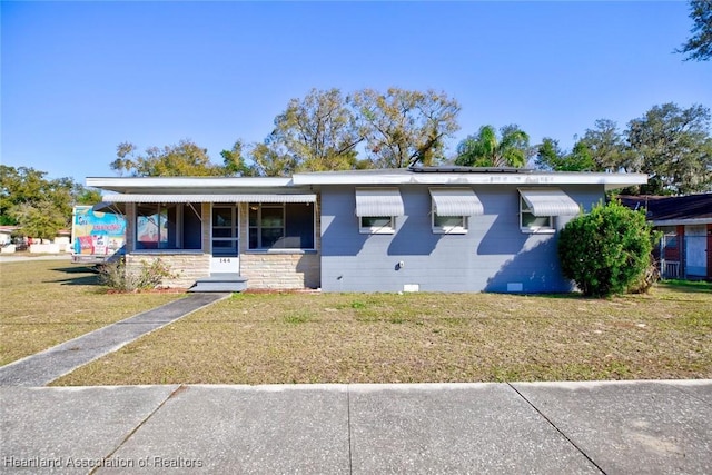 view of front facade with a front lawn