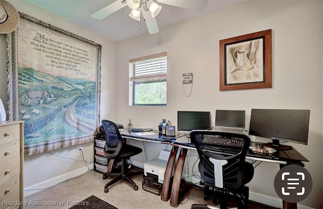 tiled office featuring ceiling fan