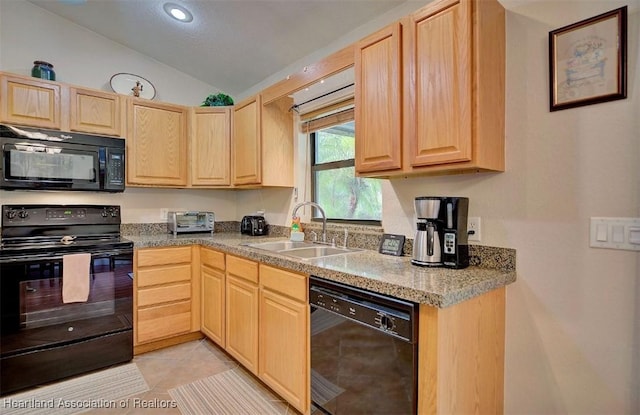 kitchen with vaulted ceiling, sink, black appliances, light brown cabinets, and light tile patterned floors