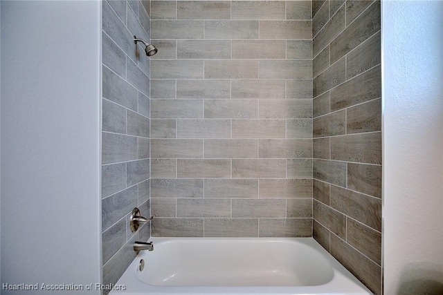 full bath featuring shower / bath combination
