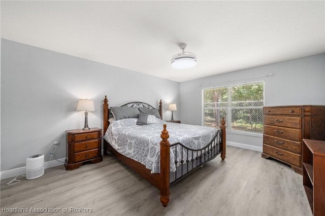 2036 Ashley Oaks Cir, Sebring, FL 33870 - bedroom featuring light wood-style floors and baseboards