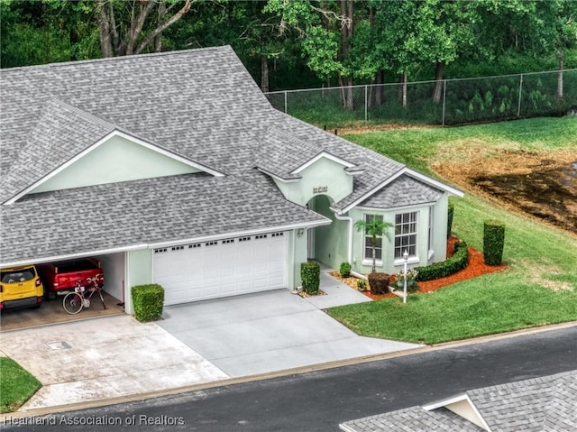 2036 Ashley Oaks Cir, Sebring, FL 33870 - single story home featuring roof with shingles, a garage, and driveway