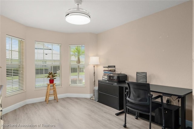 2036 Ashley Oaks Cir, Sebring, FL 33870 - office space featuring wood finished floors and baseboards