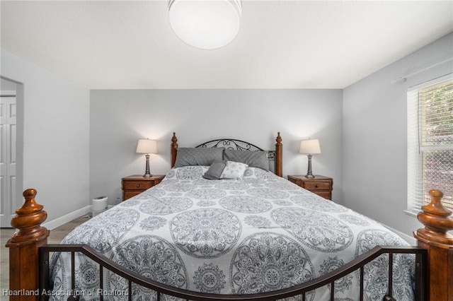 2036 Ashley Oaks Cir, Sebring, FL 33870 - bedroom with wood finished floors and baseboards