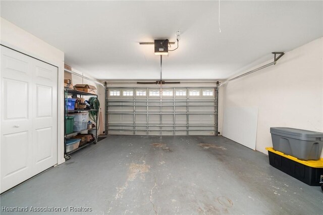 2036 Ashley Oaks Cir, Sebring, FL 33870 - garage with a garage door opener