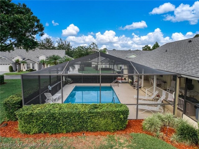2036 Ashley Oaks Cir, Sebring, FL 33870 - view of swimming pool with a patio and a lanai