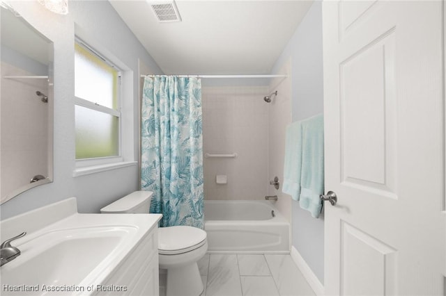 2036 Ashley Oaks Cir, Sebring, FL 33870 - full bathroom with toilet, shower / tub combo, vanity, and marble finish flooring