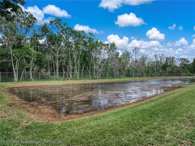 2036 Ashley Oaks Cir, Sebring, FL 33870 - water view with a forest and fence