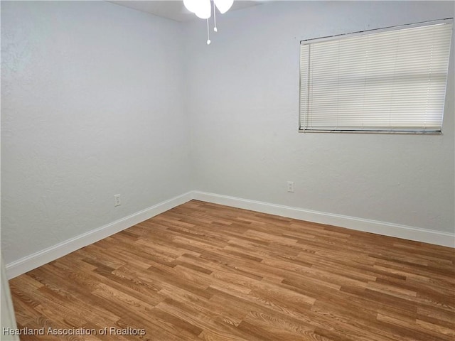 spare room with light hardwood / wood-style floors