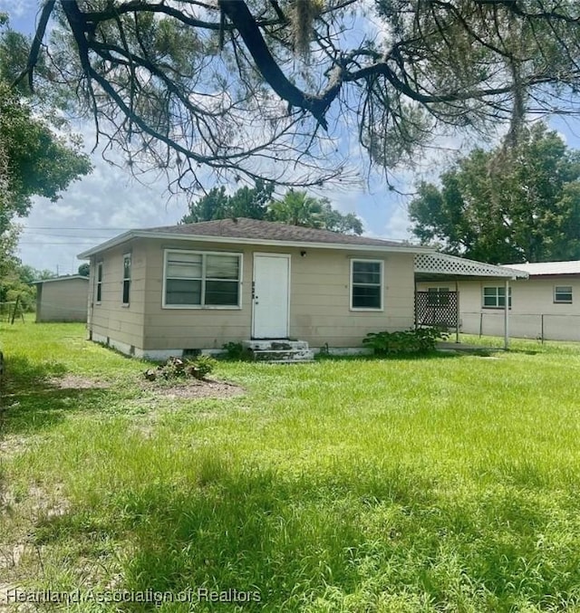 view of front of home with a front yard