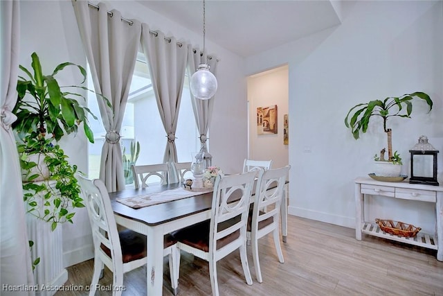 dining area with light wood-type flooring