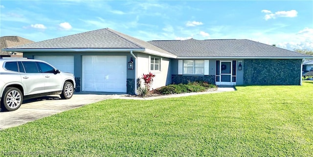 single story home with a garage and a front yard