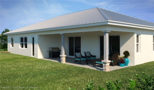 rear view of house featuring a lawn and a patio