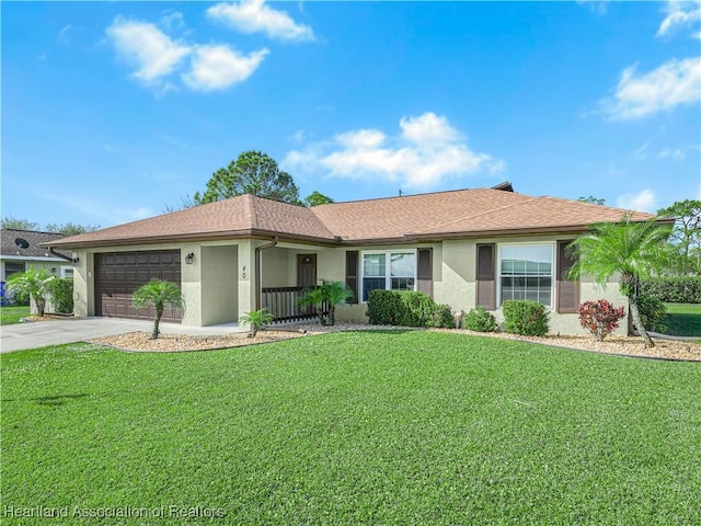 ranch-style home with a front yard and a garage