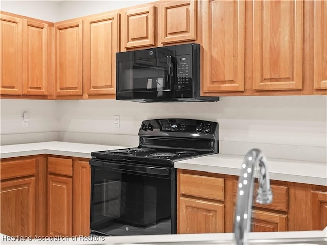 kitchen featuring black appliances