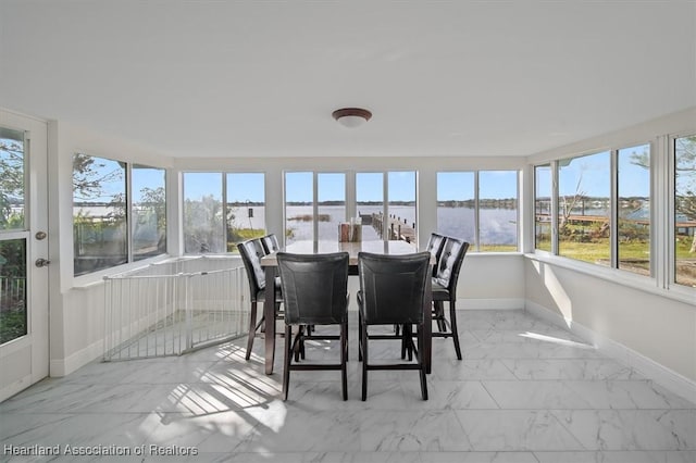 sunroom / solarium featuring a wealth of natural light