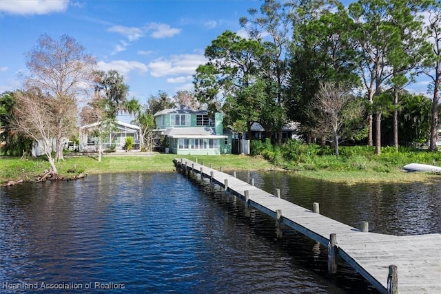 dock area with a water view