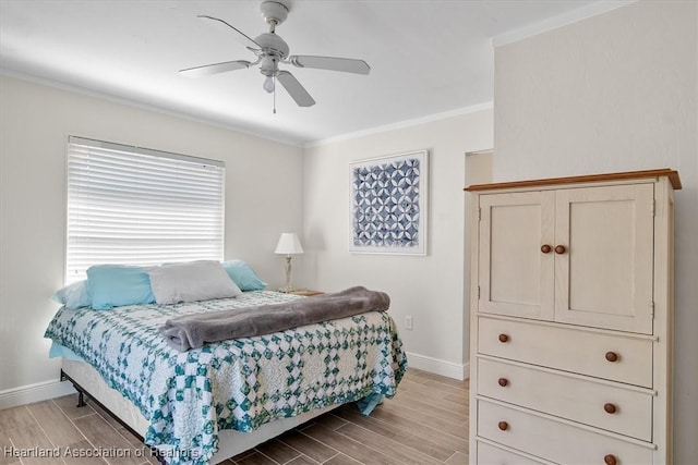 bedroom featuring ornamental molding and ceiling fan