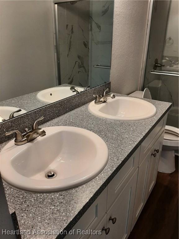1508 Las Villas Blvd, Sebring, FL 33870 - full bath with toilet, a marble finish shower, and double vanity