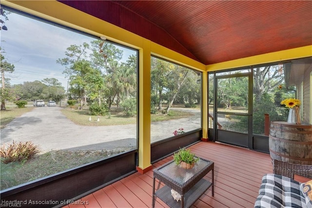 sunroom / solarium with lofted ceiling