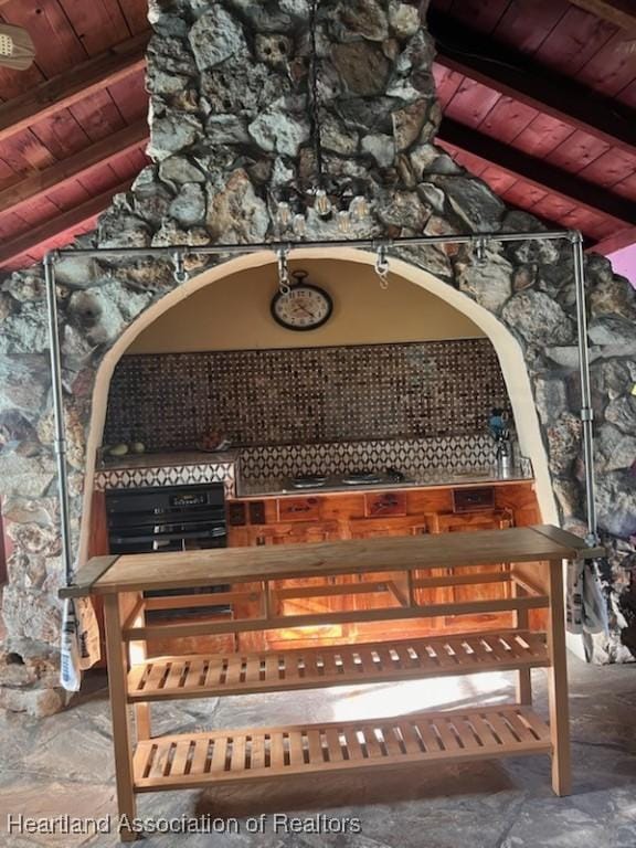 12115 S US Highway 41, Gibsonton, FL 33534 - detailed view of a wood ceiling with exposed beams and stainless steel gas stovetop