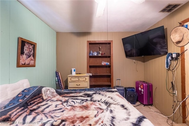 bedroom featuring visible vents