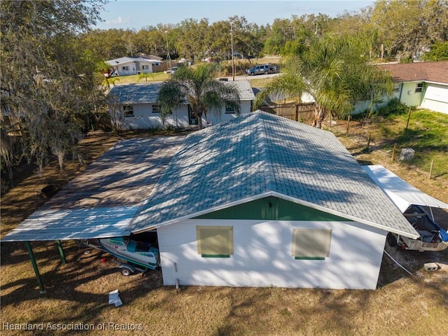back of house with fence