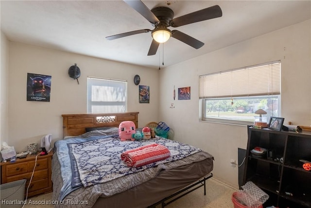 bedroom featuring carpet floors and a ceiling fan