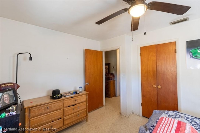 bedroom with a ceiling fan and visible vents