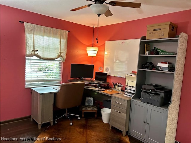 home office featuring ceiling fan and dark hardwood / wood-style floors